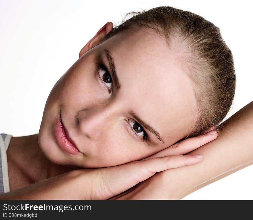 Portrait of attractive beautiful young girl posing on white background. Portrait of attractive beautiful young girl posing on white background