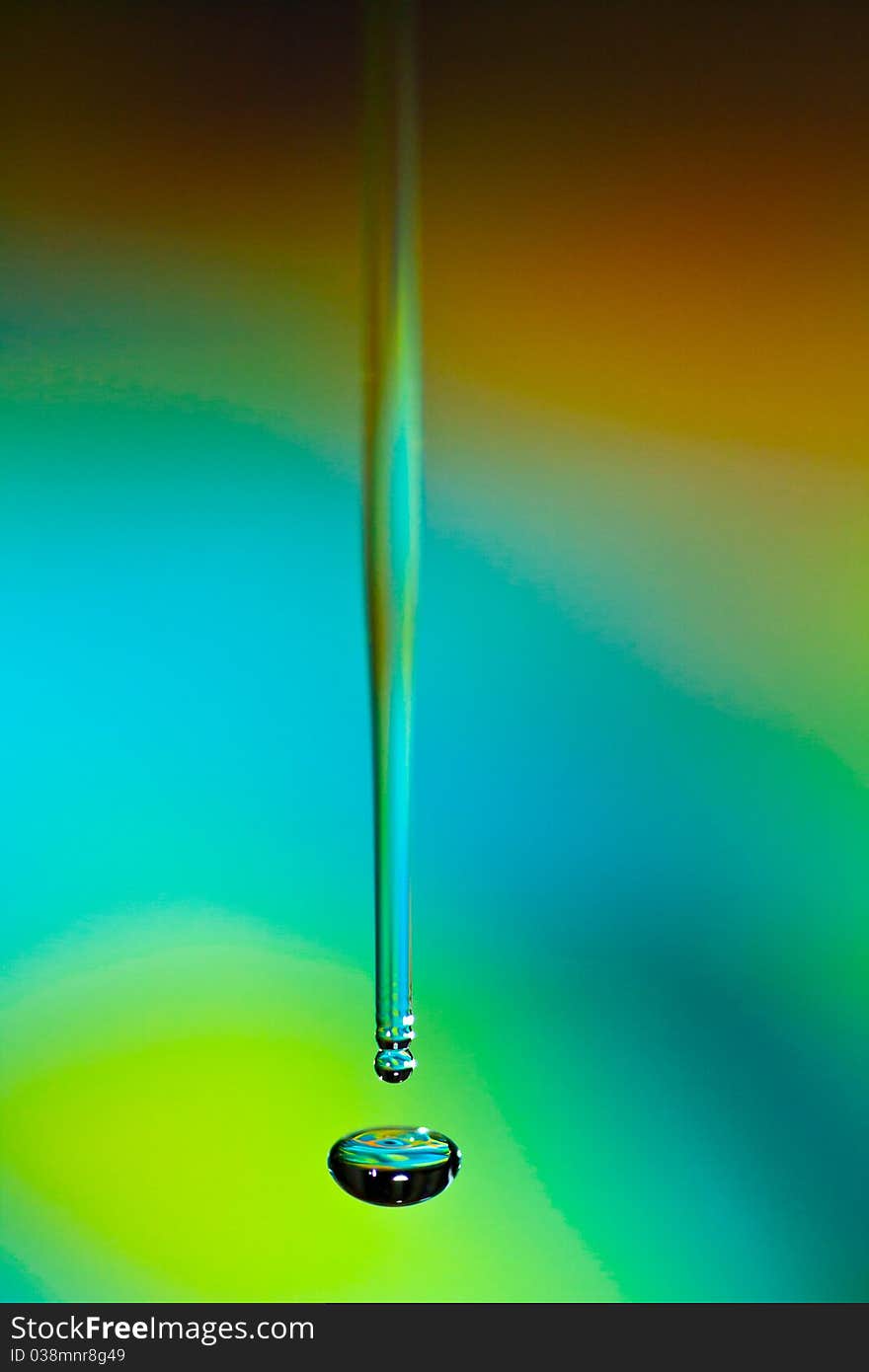 A column of water falling into a pool.