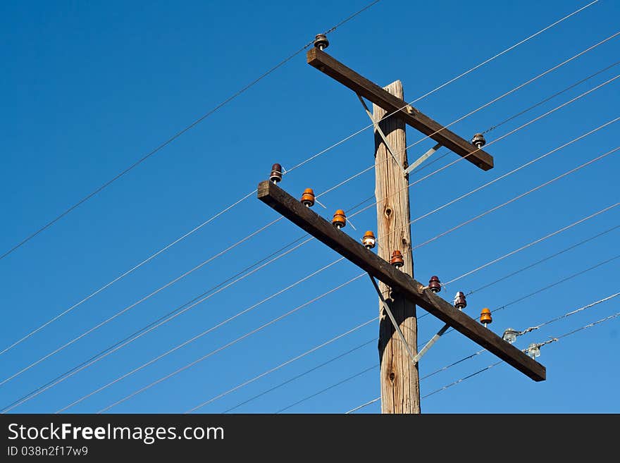 A photograph of and old power line. This could represent past energy methods, and a new renewable alternative energy. A photograph of and old power line. This could represent past energy methods, and a new renewable alternative energy.