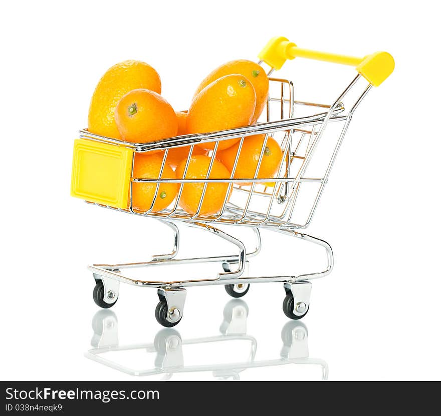 Tangerine in the shopping cart. Isolated.