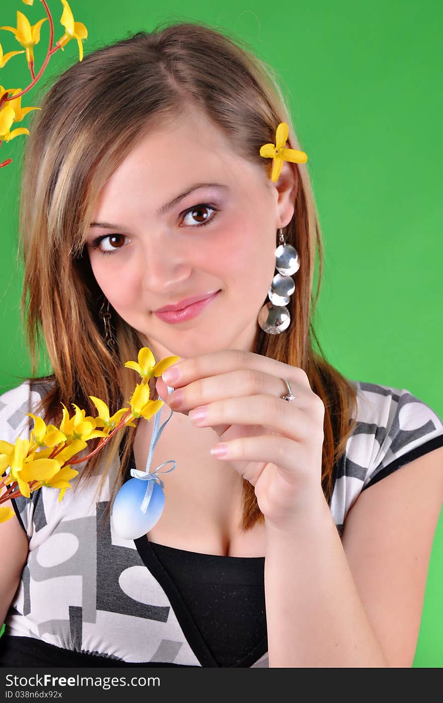 Young beautiful girl preparing for Easter