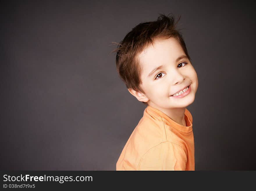 Portrait of happy smiling beautiful little boy, studio shot. Portrait of happy smiling beautiful little boy, studio shot