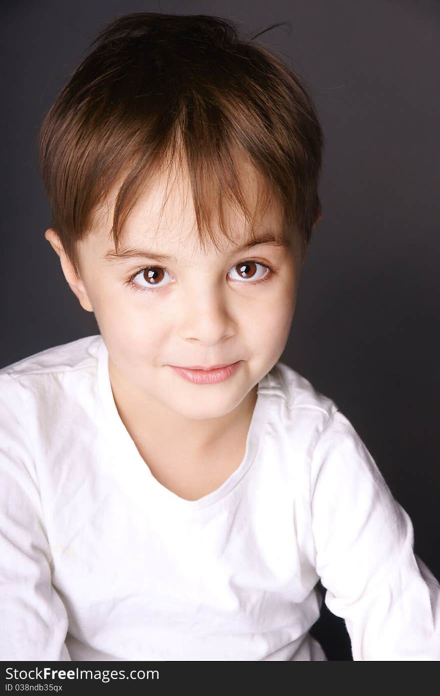 Portrait of cute happy smiling little boy, studio shot. Portrait of cute happy smiling little boy, studio shot