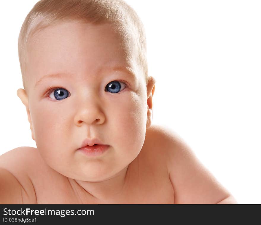 Close-up portrait of cute baby-boy with blue eyes on white background