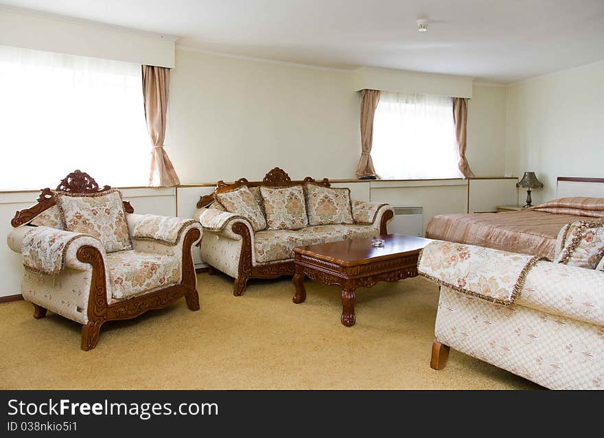 Hotel room with beautiful interior design. Sofa