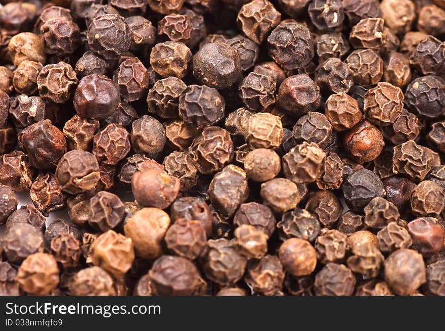 Black Peppercorns background