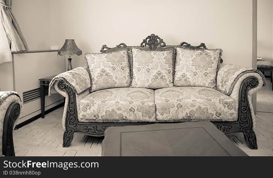 Hotel room with beautiful interior design. Sofa