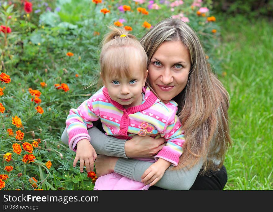 Mom and daughter in the garden