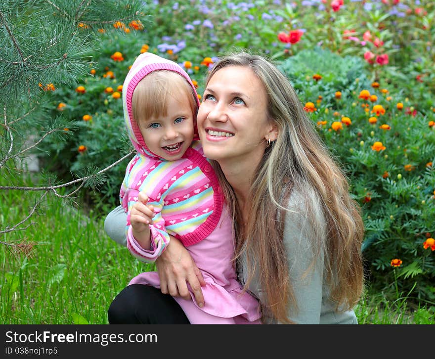 Mom and daughter in the garden