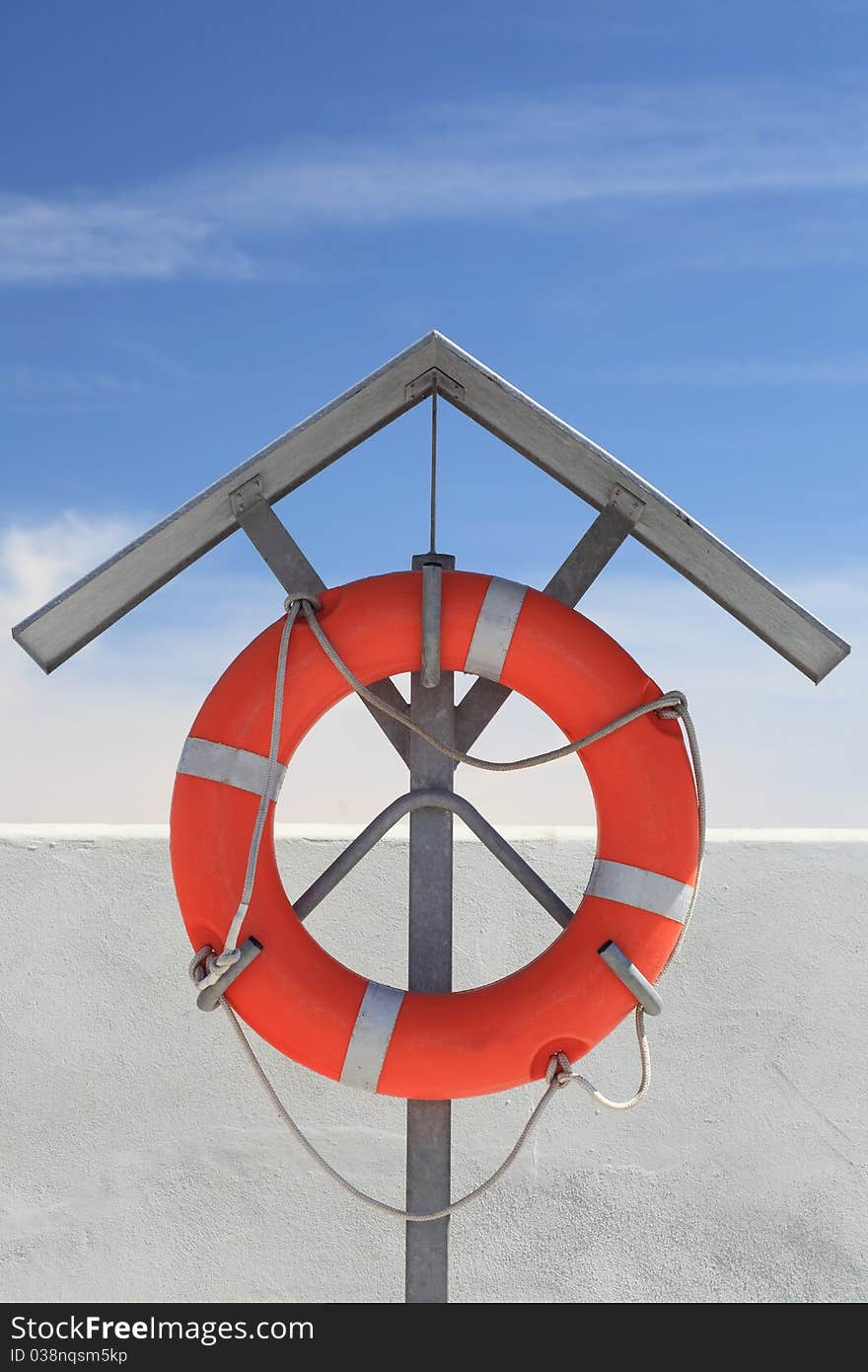 A detailed shot of a life buoy - blue sky