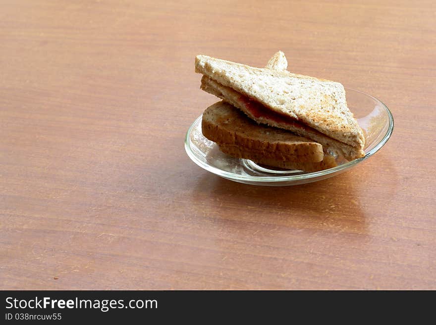 Baked whole wheat bread on wood