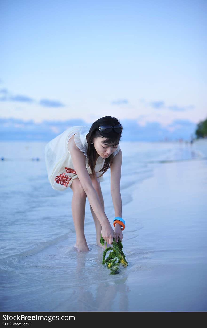 Asian Girl on the beach of Saipan Island