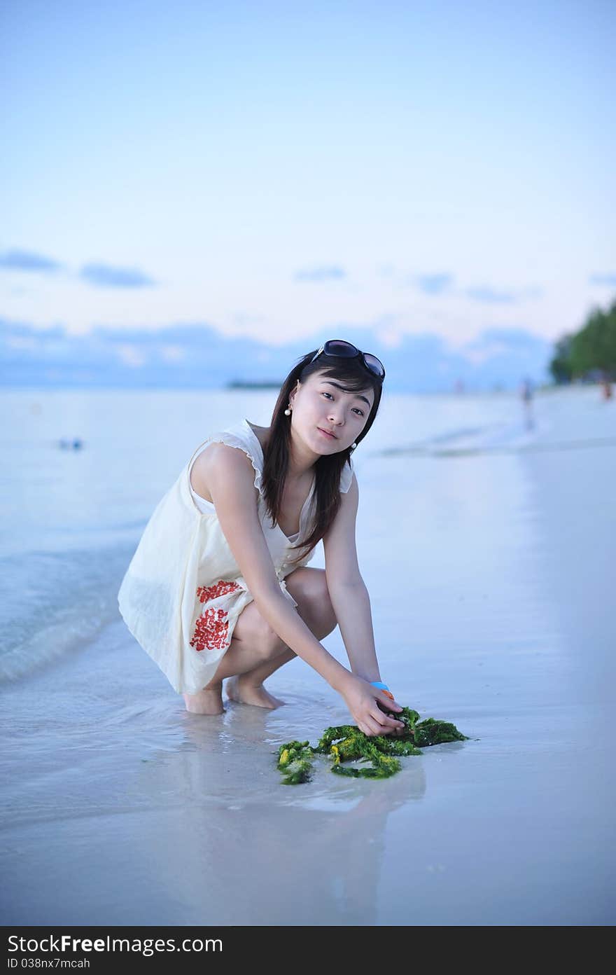 Asian Girl on the beach of Saipan Island