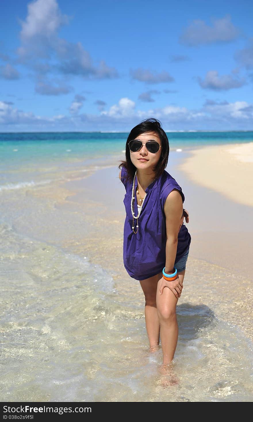 Asian Girl on the beach of Saipan Island