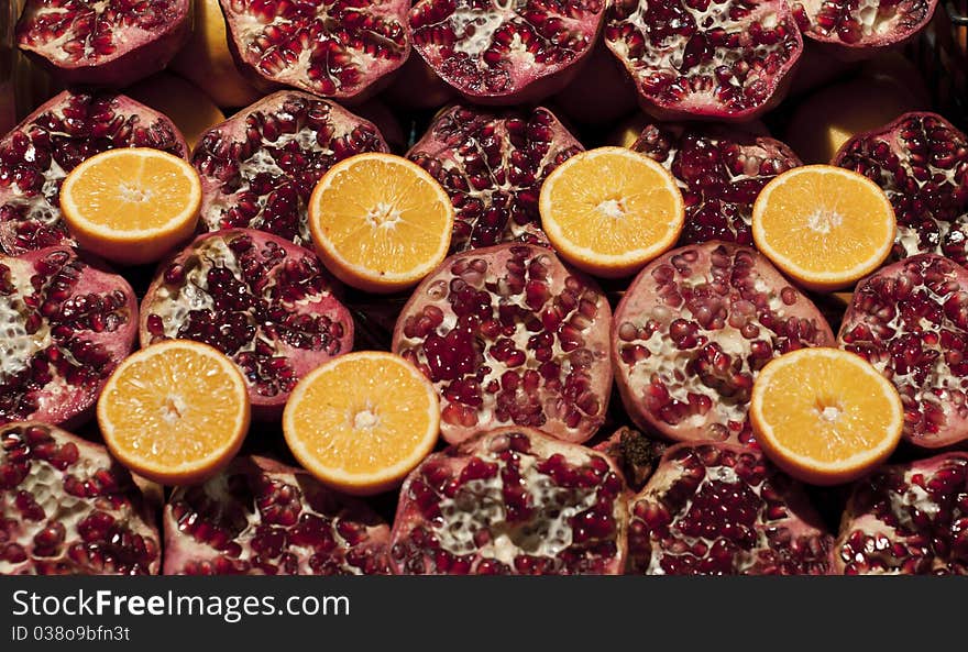 Photo of some pomegranates and oranges. Photo of some pomegranates and oranges.