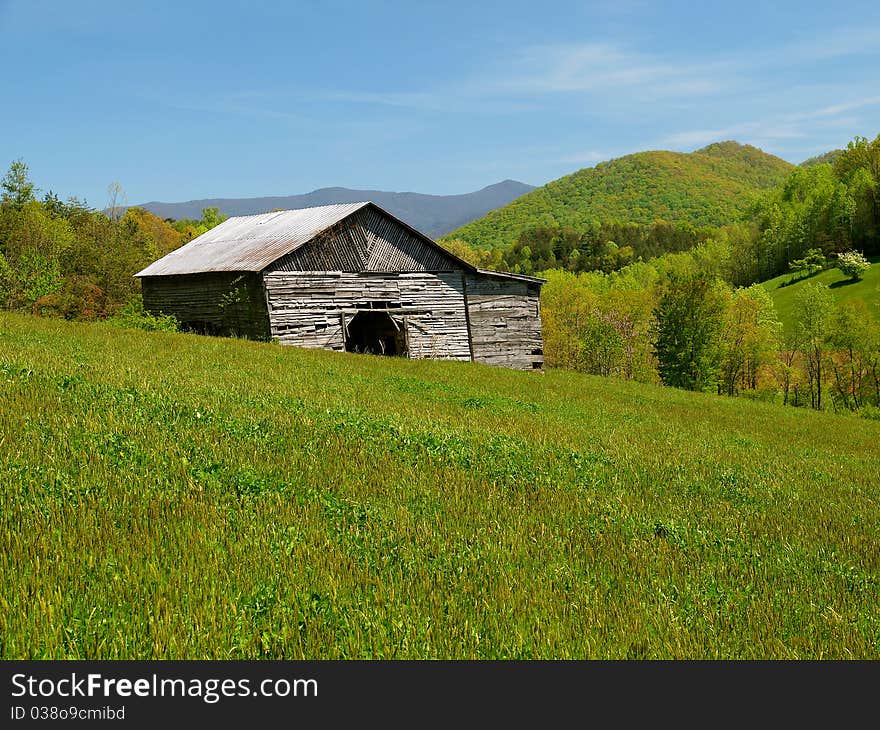 Mountain barn in spring