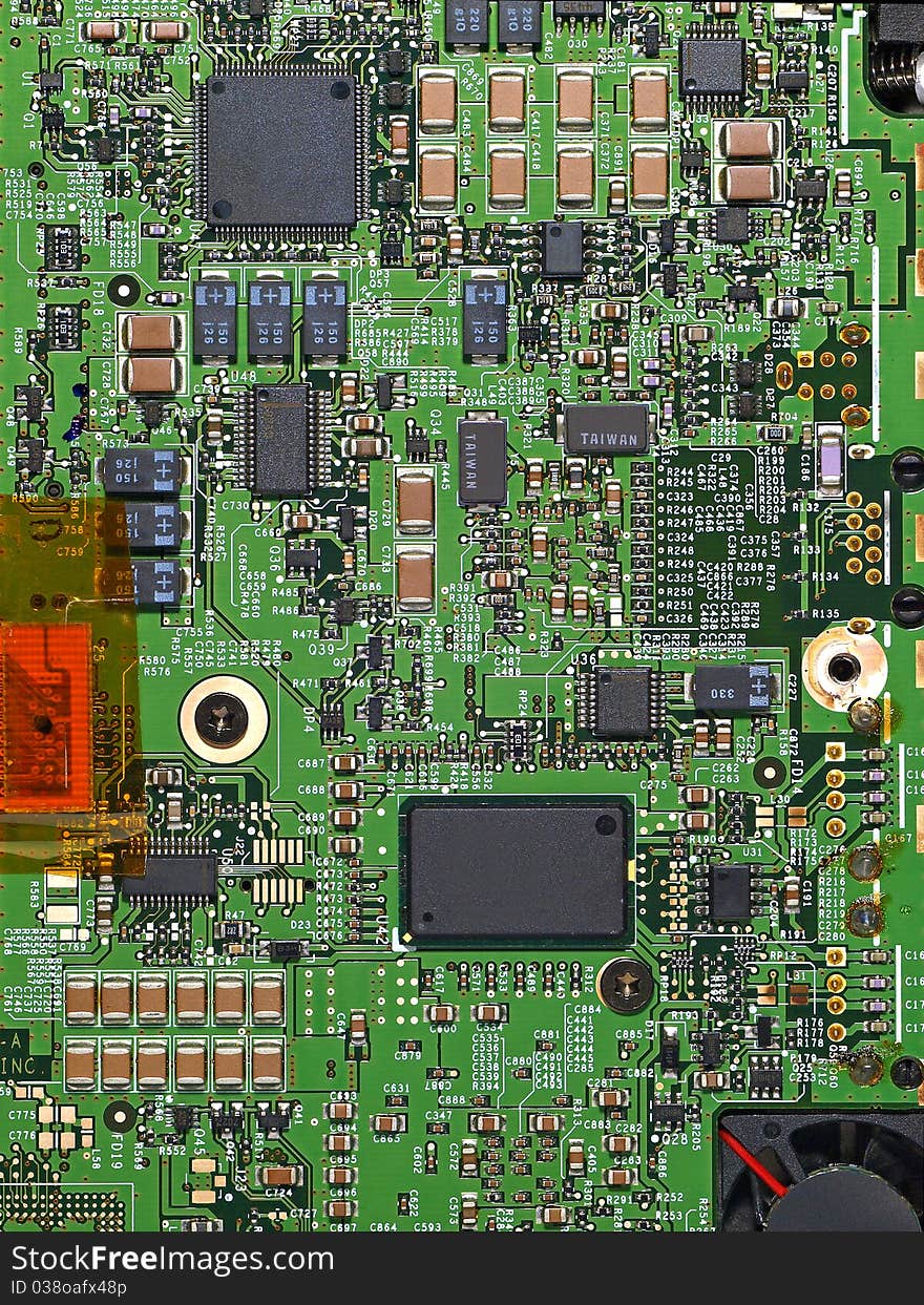 Detailed image of computer motherboard and integrated circuits. Detailed image of computer motherboard and integrated circuits.