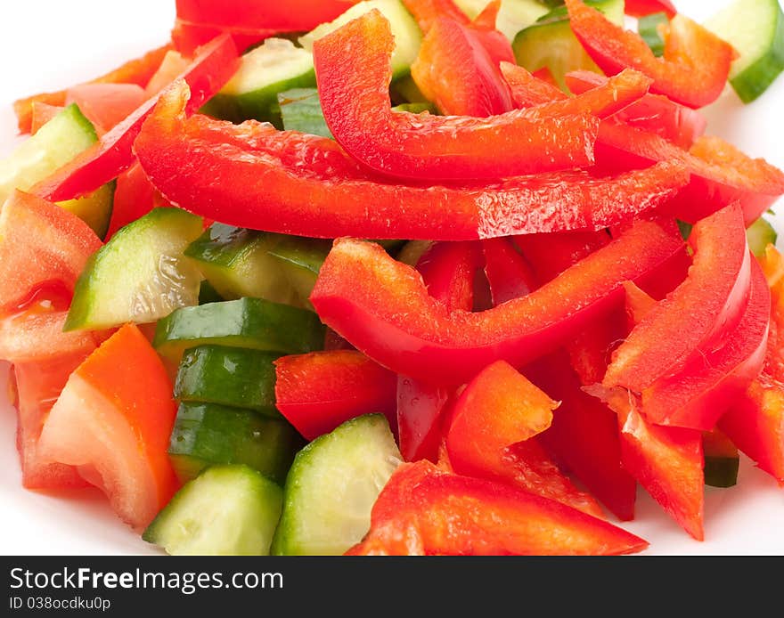 Fresh vegetables and other foodstuffs on white background