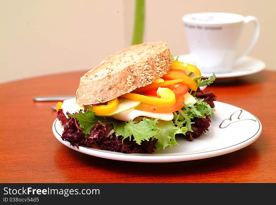 Ham sandwich with red pepper and leaf lettuce