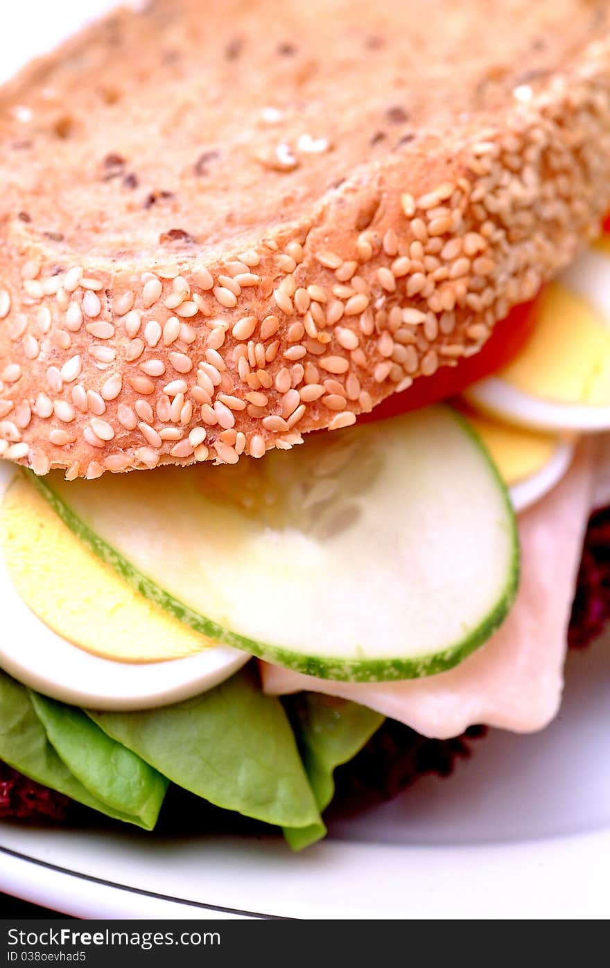 Ham sandwich with red pepper and leaf lettuce