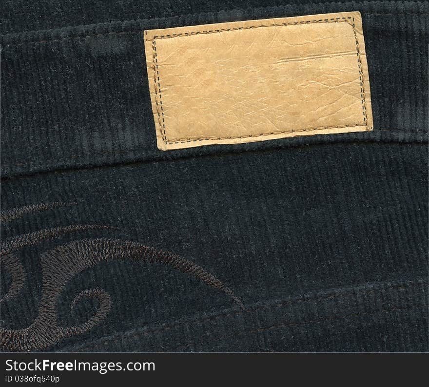 Blank leather label on jeans