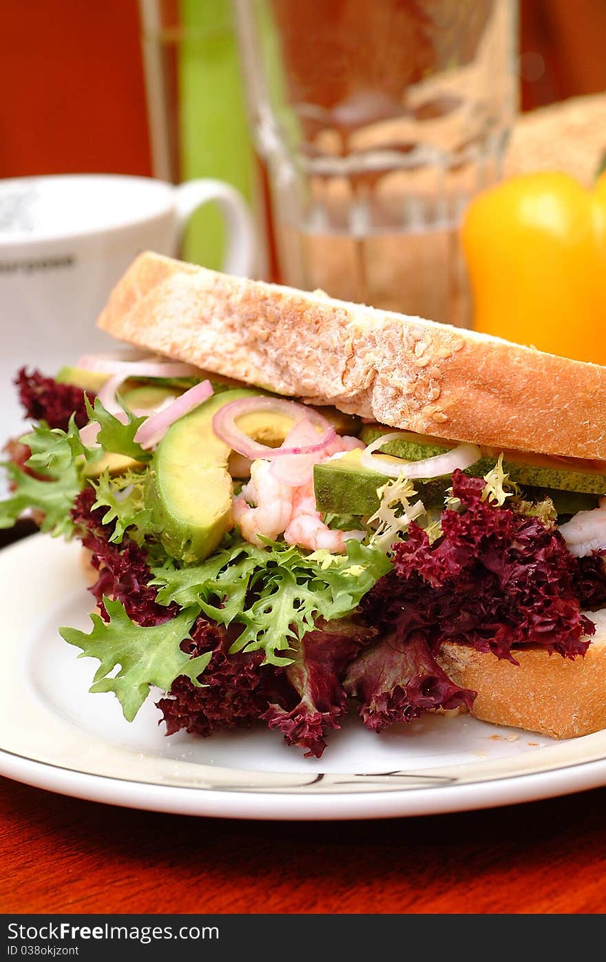 Sandwich with avocado and leaf lettuce