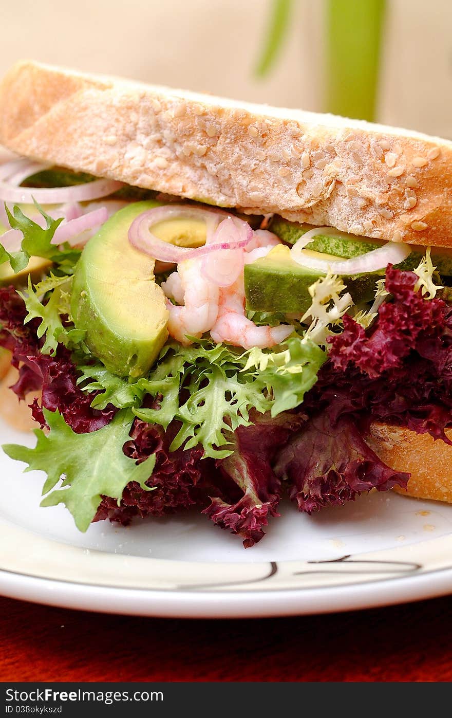 Sandwich with avocado and leaf lettuce