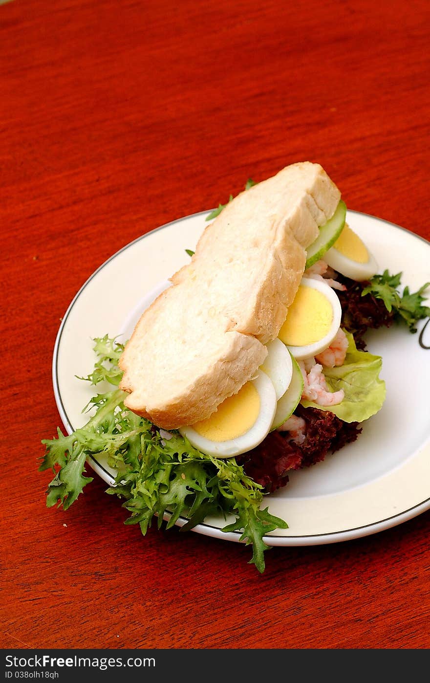 Sandwich with avocado and leaf lettuce