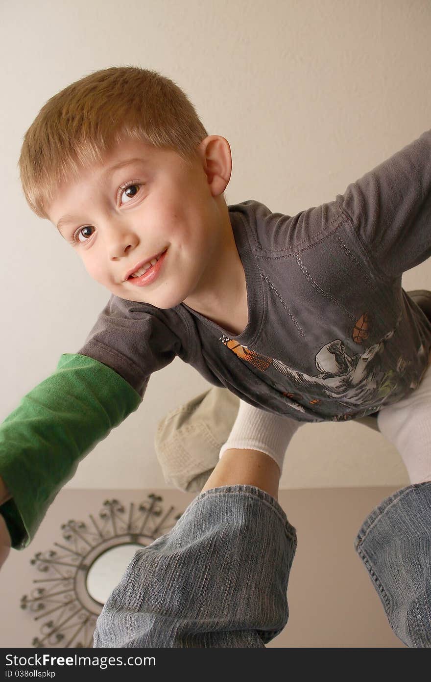 A little boy getting an airplane. A little boy getting an airplane.