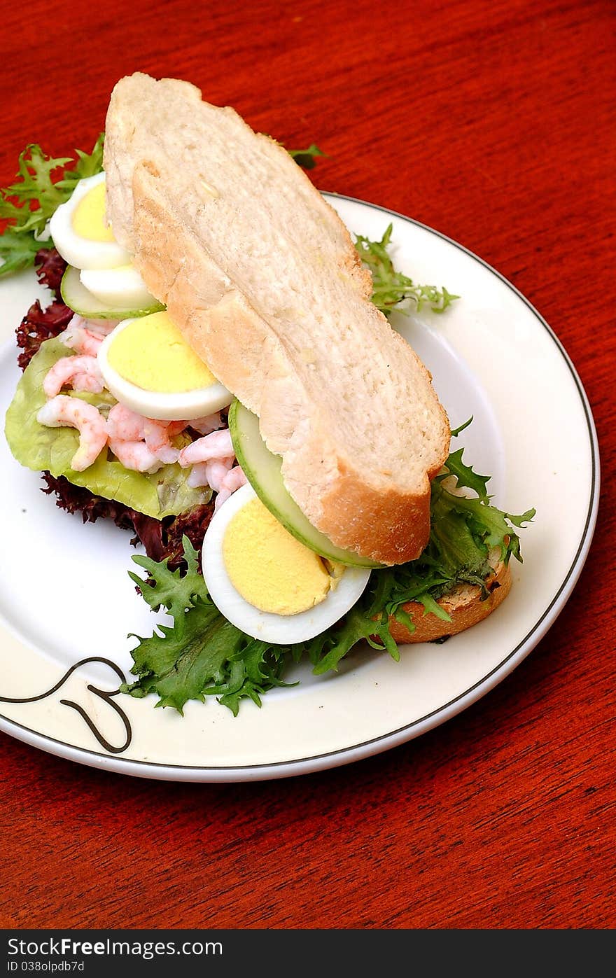 Sandwich with avocado and leaf lettuce