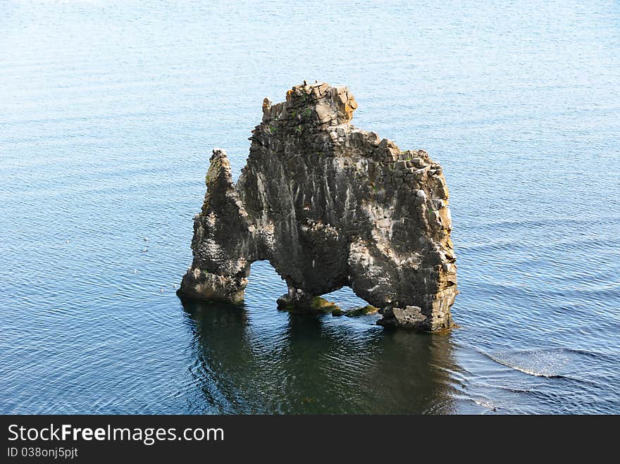 Lone rock in the sea in Iceland. Lone rock in the sea in Iceland