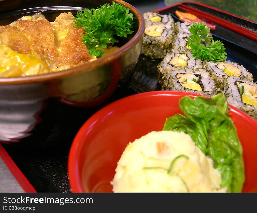 Assorted japanese food bento served