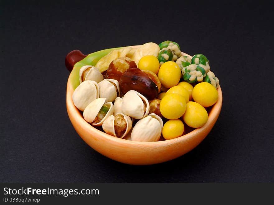 Assortment of asian nuts on jug