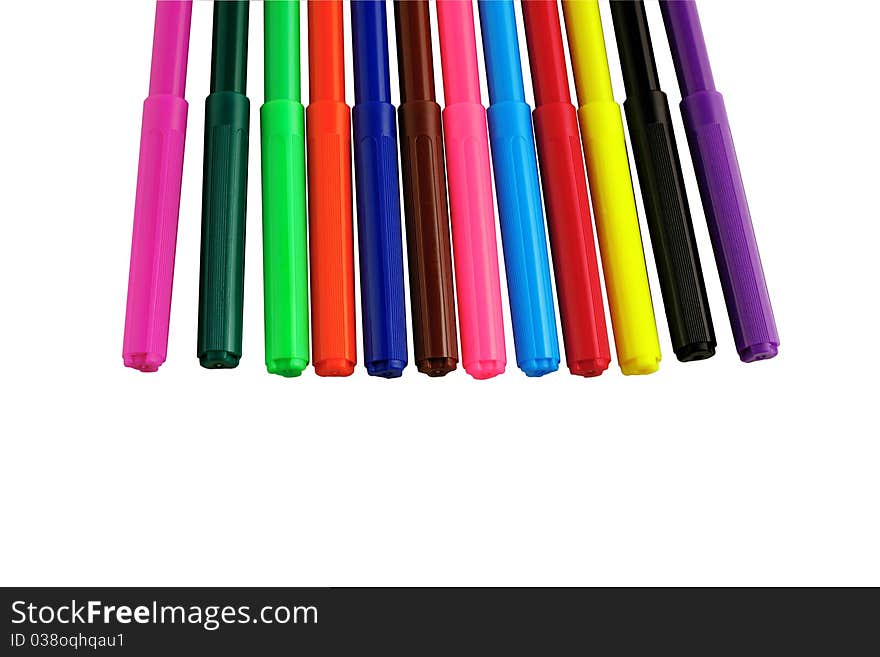 Colored markers on white background