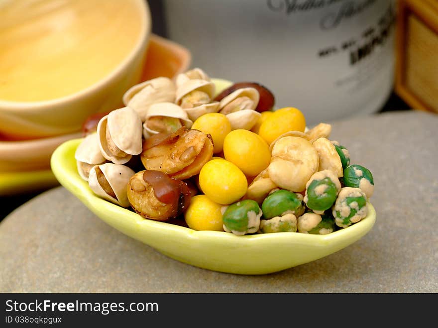 Assortment of asian nuts on jug