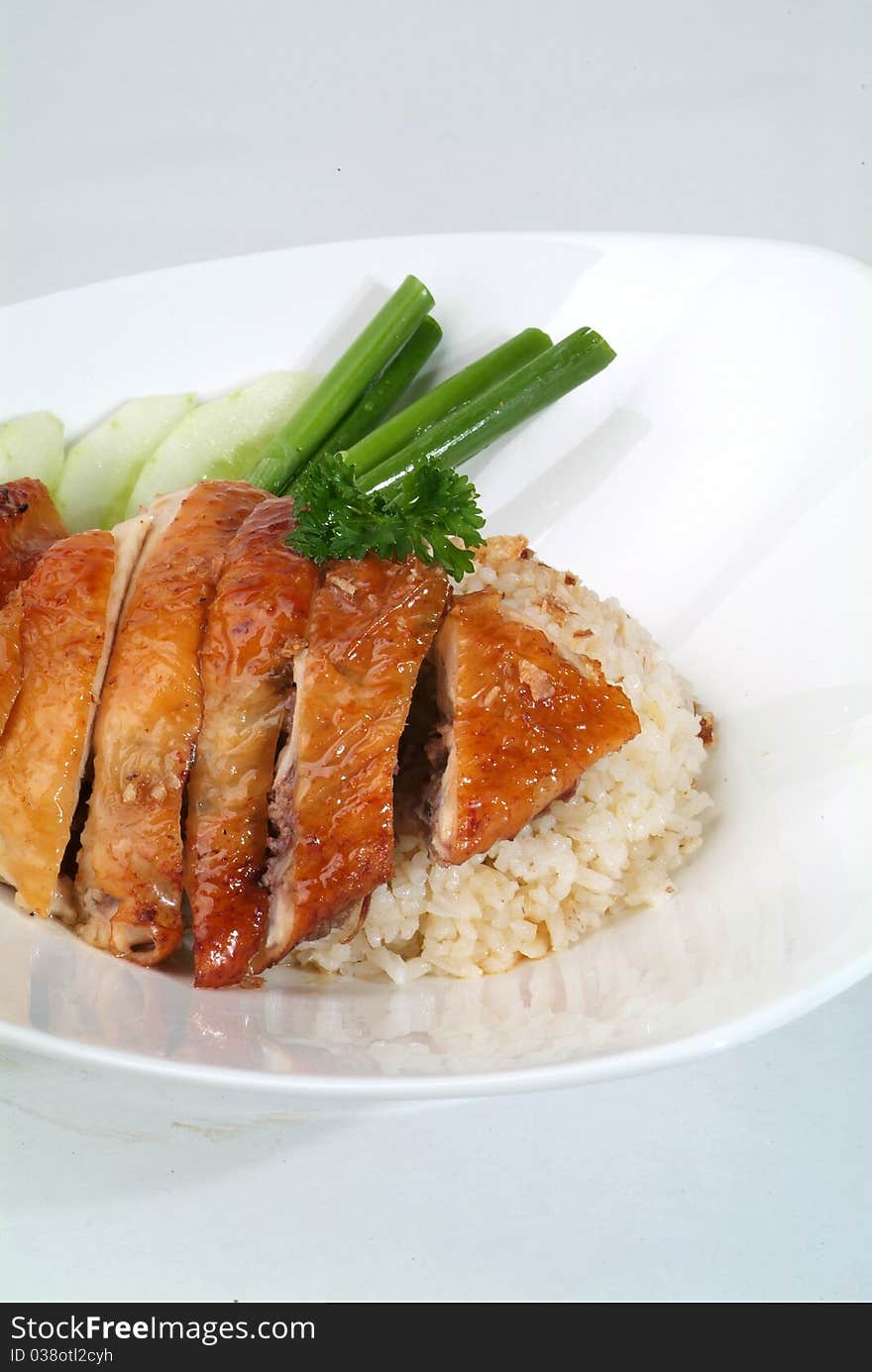 A plate of traditional malaysian chinese chicken rice