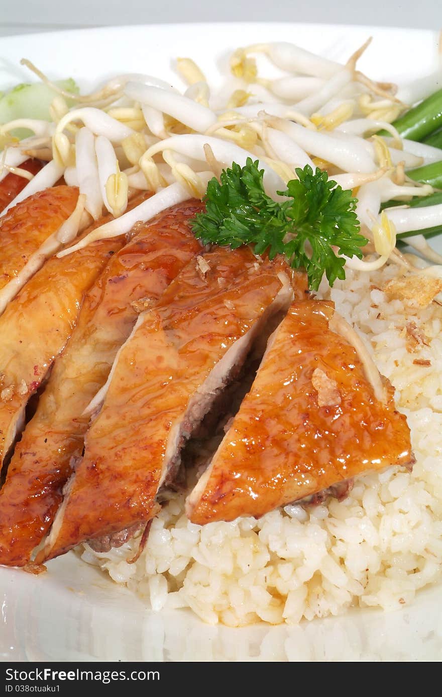 A plate of traditional malaysian chinese chicken rice