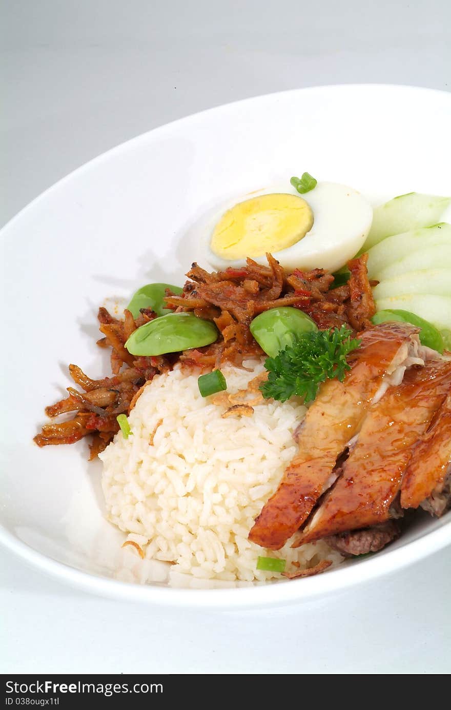 A plate of traditional malaysian chinese chicken rice