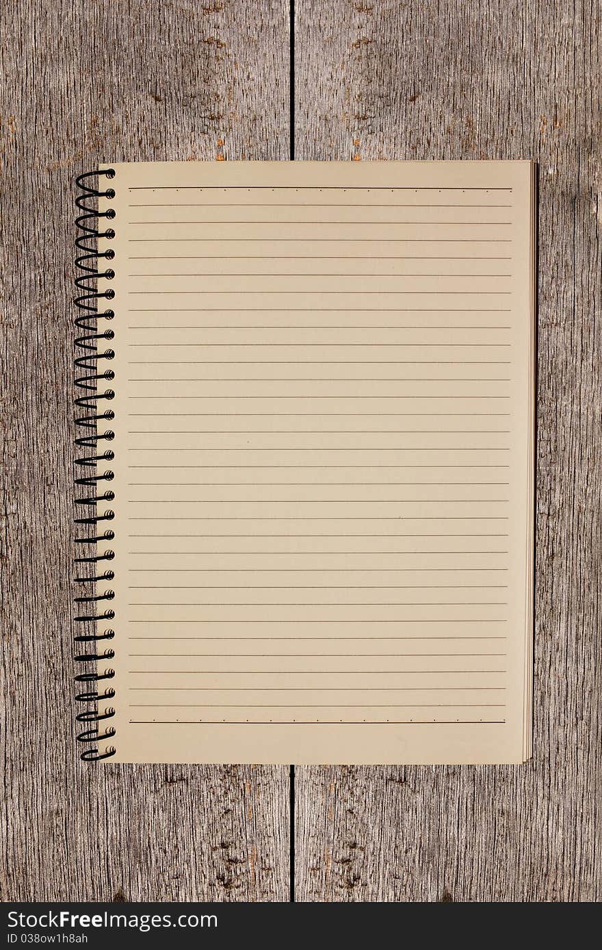 Vintage notebook on wood background