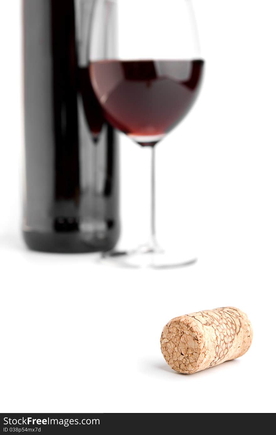 Wine cork and glass on white. Wine cork and glass on white