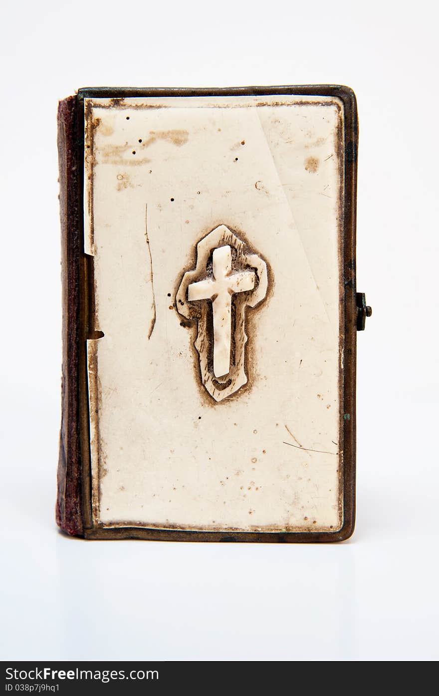 Old prayer book isolated on a white background.