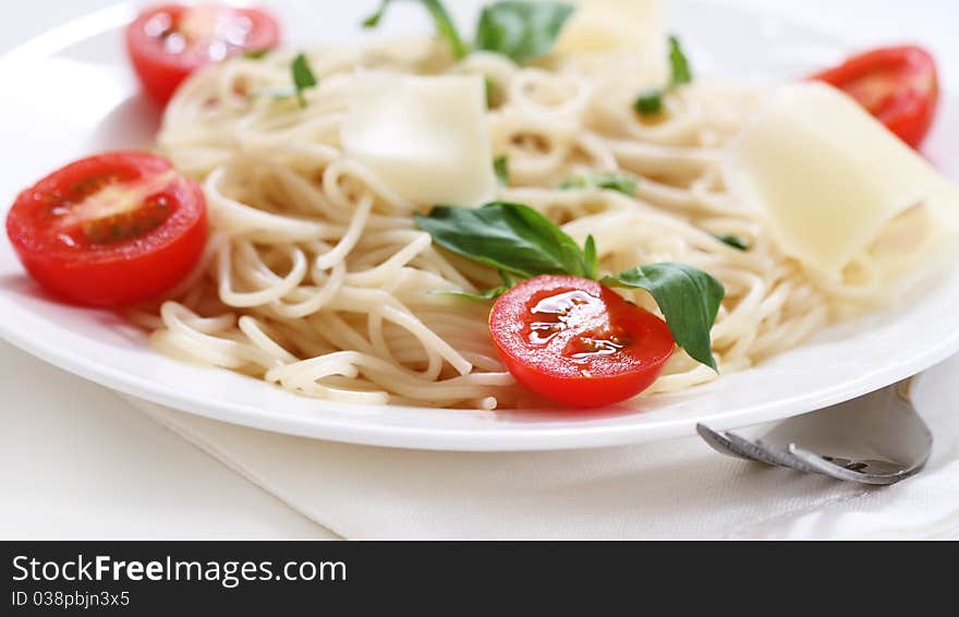 Spaghetti with tomato and parmesan cheese