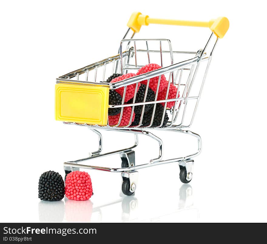 Raspberry blackberry fruit in the shopping cart.  Isolated.