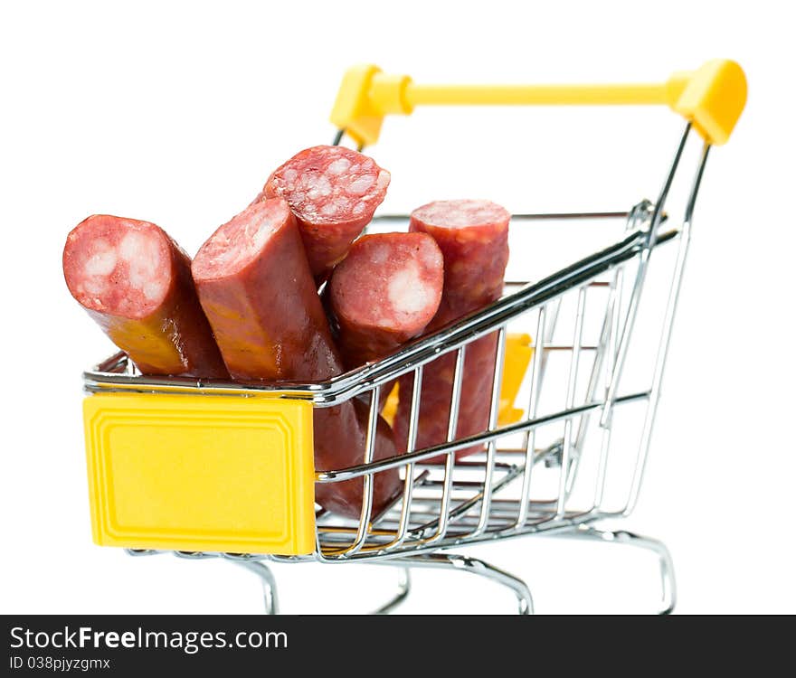 Salami sausage in the shopping cart. Isolated.