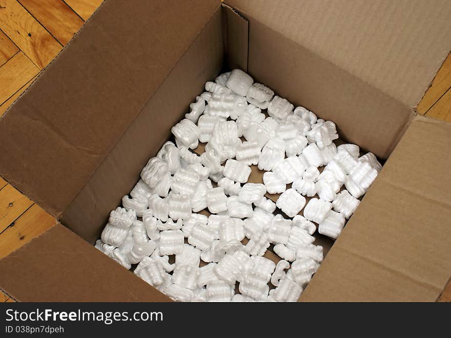 A box with some shipping peanuts for protection against damage on any merchandise. A box with some shipping peanuts for protection against damage on any merchandise.
