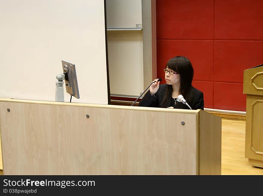 Asian business woman doing presentation in office