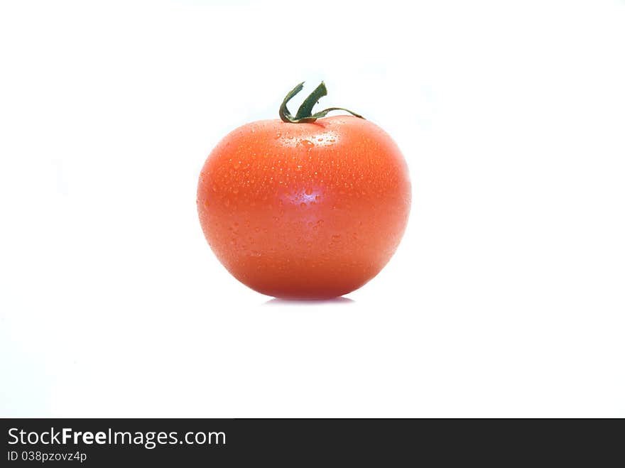 Tomato isolated on white background.