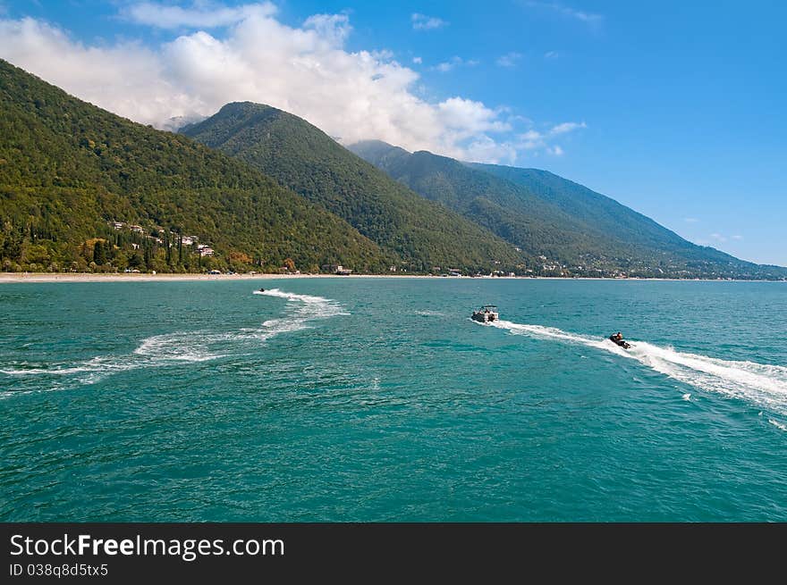 Mountains and the sea.