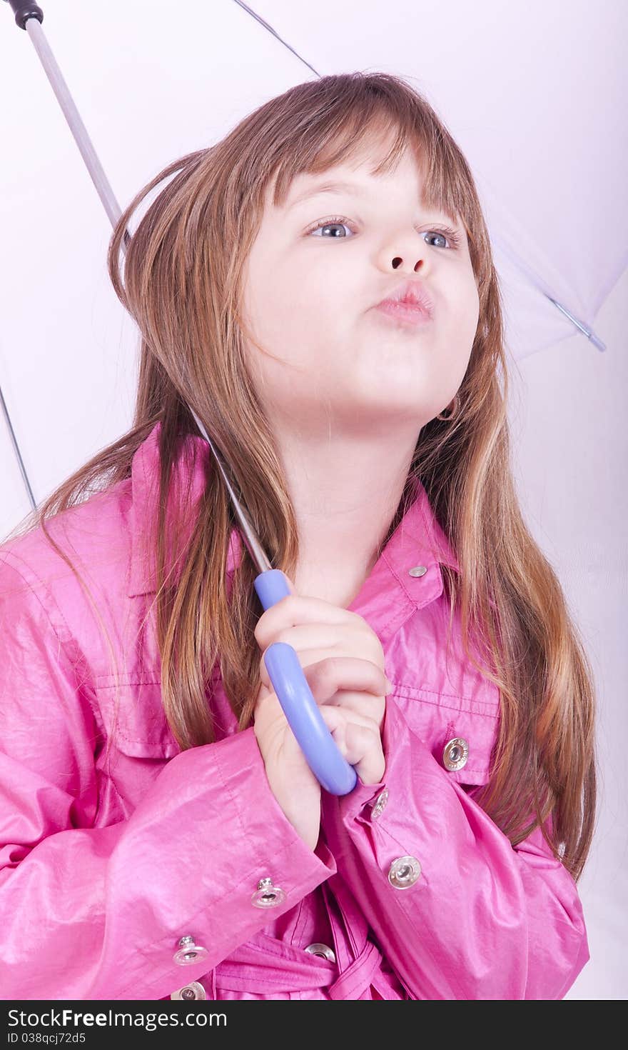 Girl posing with umbrella