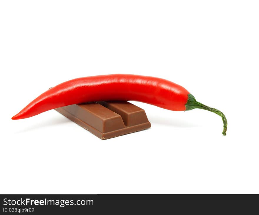 Red pepper on  Chocolate,  white background